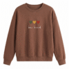 SD Hoodies Be Kind brown crew neck front view triple heart embroidery