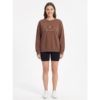 Model wearing SD Hoodies Be Kind brown embroidered crew neck relaxed fit