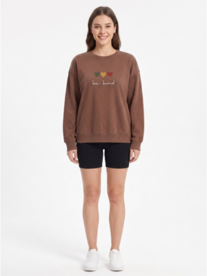 Model wearing SD Hoodies Be Kind brown embroidered crew neck relaxed fit